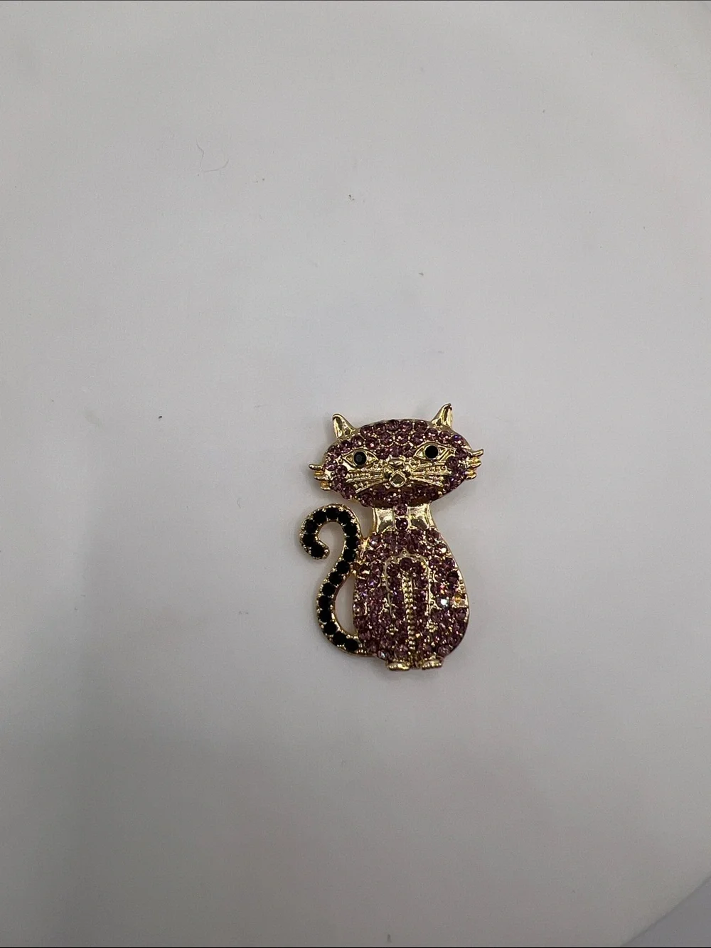 476. Gold-Tone Cat Brooch with Purple and Black Crystals